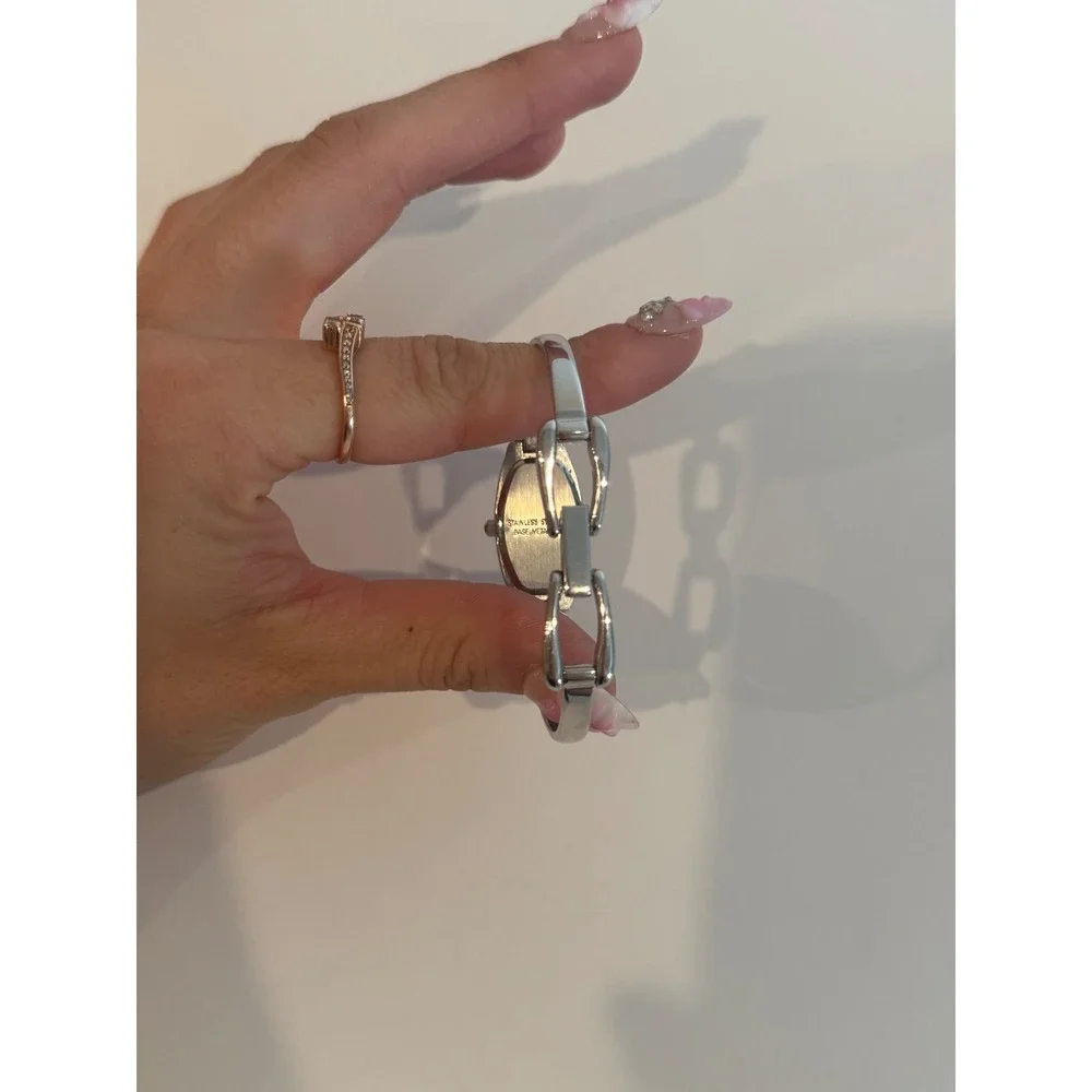 Peugeot Womens Silver Tone Bangle Watch Tonneau White Dial Quartz Timepiece